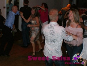 All smiles at the salsa dancing party